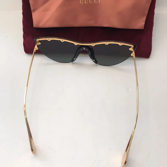New- ? Original GG0666S 001 99Gucci 99 mm Gold Sunglasses